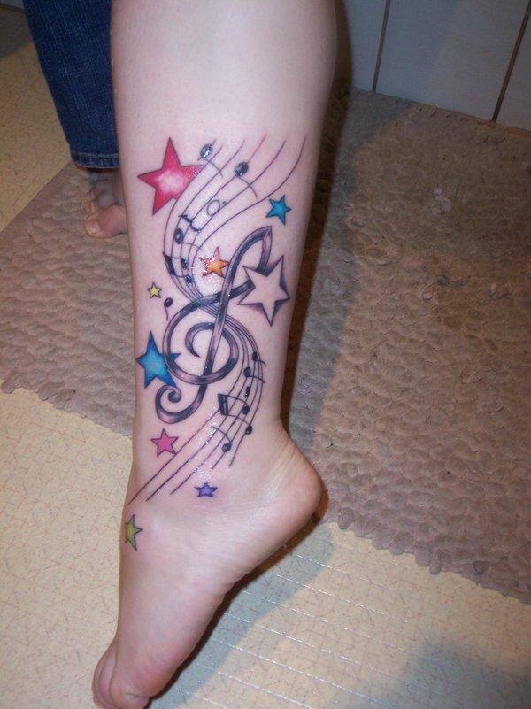 music tattoo on ankle
