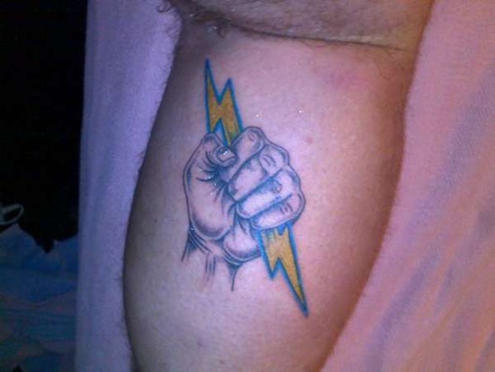 Hand holding on to a bolt of lightning Tattoo