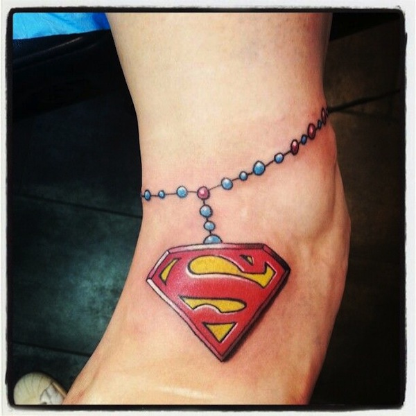 Superman feet tattoo