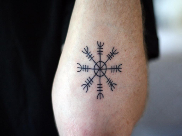 ethnic strength tattoo