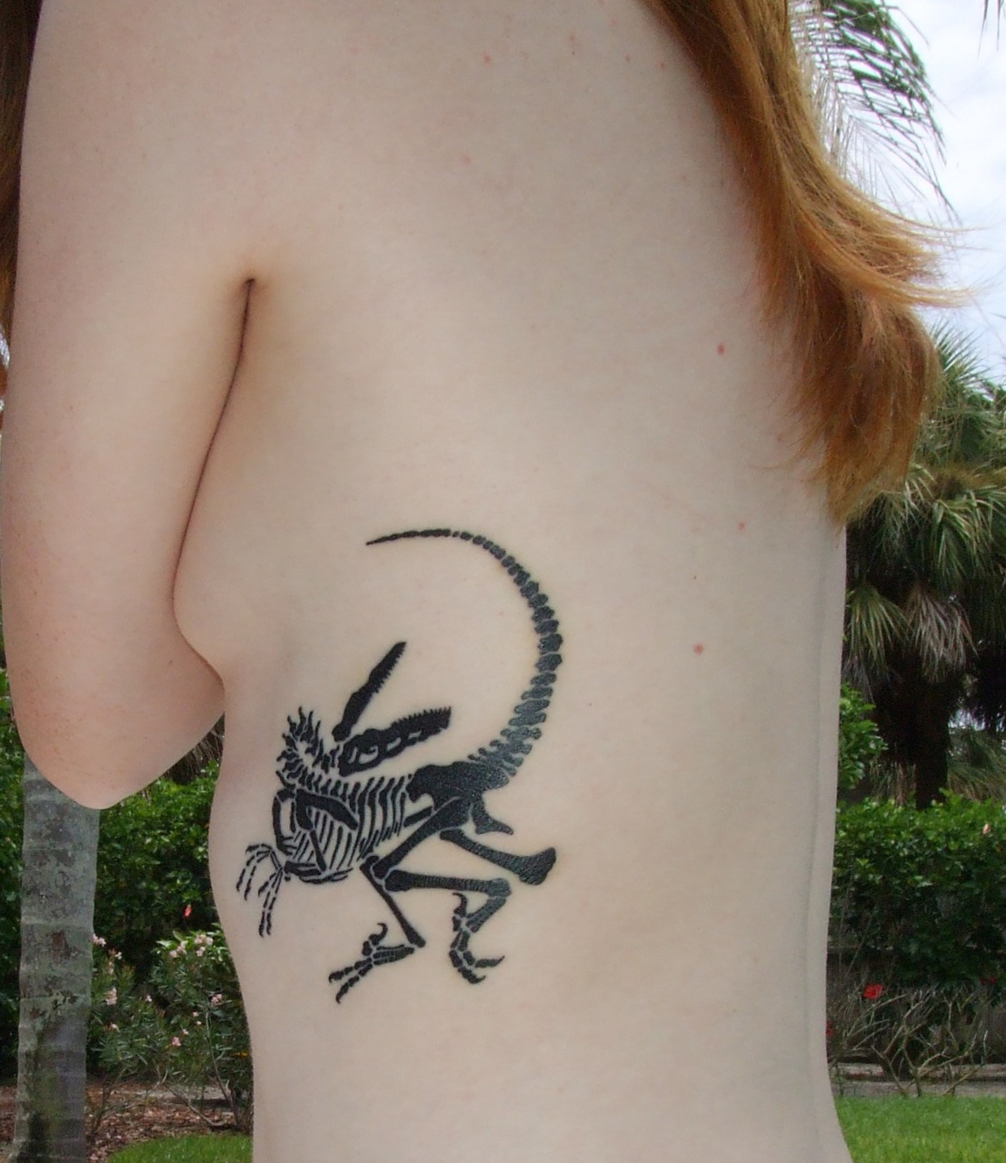 Sexy Tribal Dinosaur Tattoo