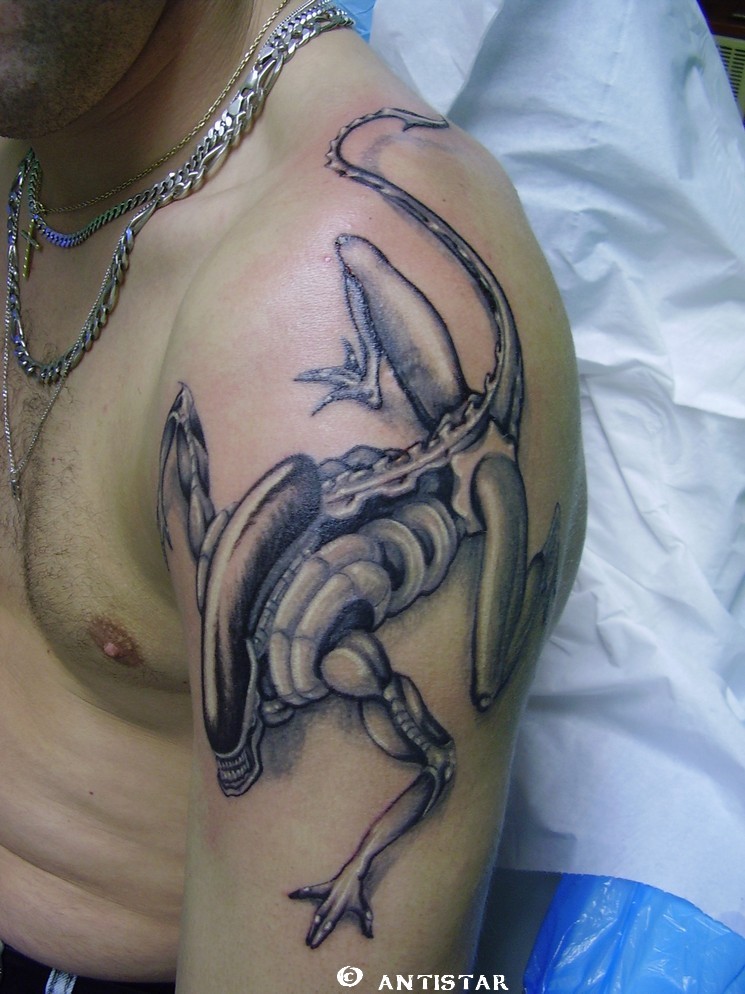 Small Alien Tattoo On Shoulder