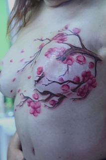 Colorful Flower Tattoo on Breast