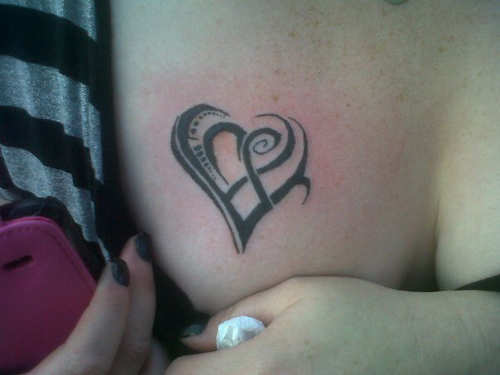 Tribal Heart Breast Tattoo