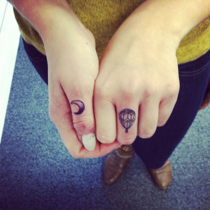Small Air Balloon Tattoo on Finger