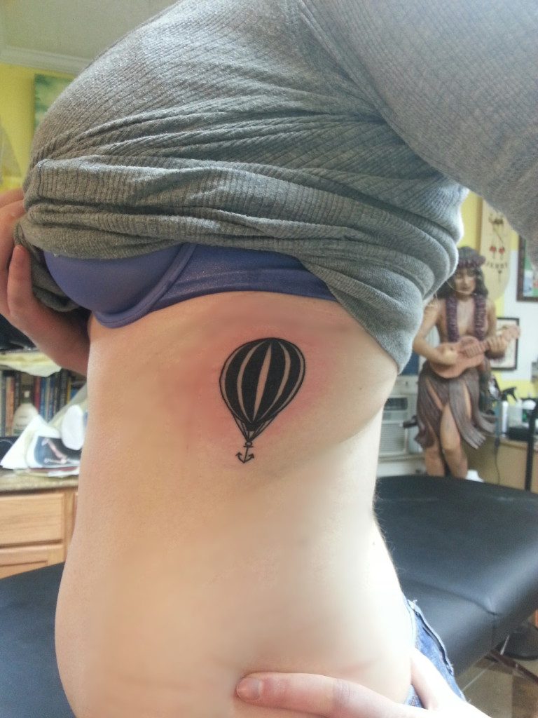 Small Air Balloon Tattoo on Girl