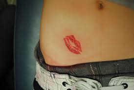 kiss tattoos on hip