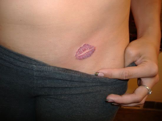 kiss tattoos on hip